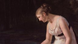 A young woman in a white dress with a black sash sits beside a body of water, gazing down, with a dark forest in the background.