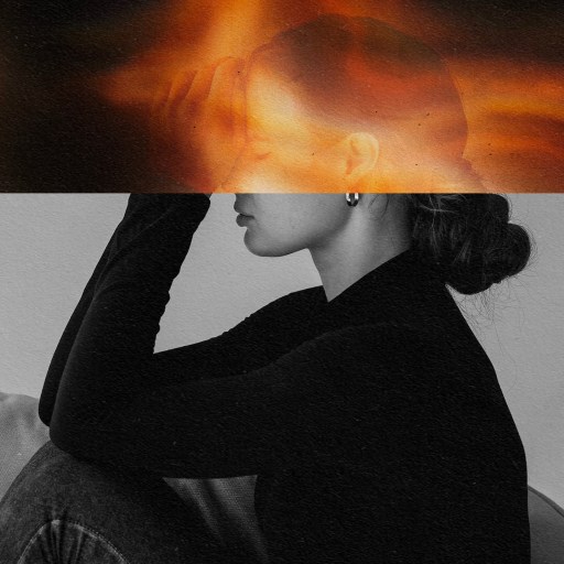 A black-and-white photo of a seated person with their head in their hand, partially overlaid with an image of flames, evocatively captures the intense struggle to treat anxiety.