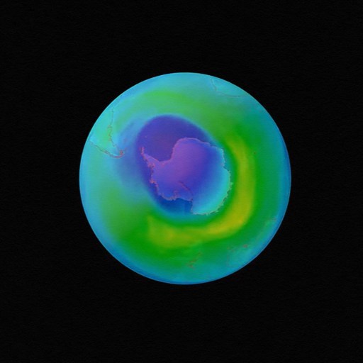 A visual representation of the hole in the ozone over Antarctica, depicted in varying colors to indicate different ozone concentration levels, against a black background.