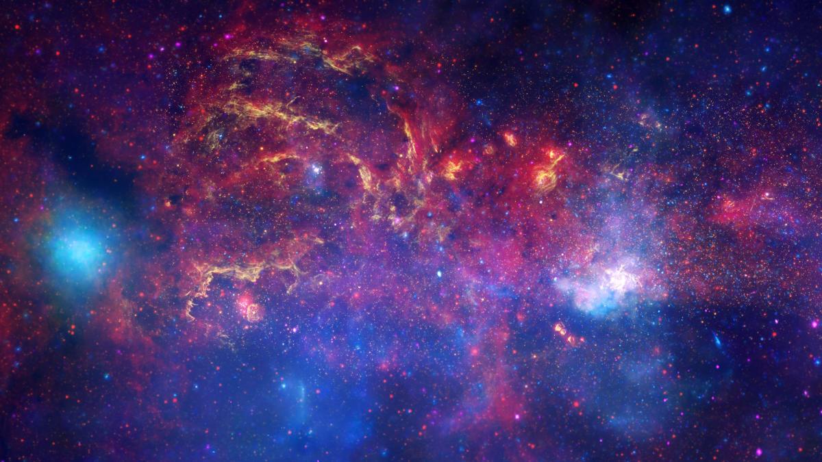 A vivid cosmic scene reveals colorful nebulae and stardust in vibrant shades of blue, purple, and orange, set against a backdrop of space. NASA observatories capture this celestial beauty, unveiling hidden holes in the vast tapestry of the universe.