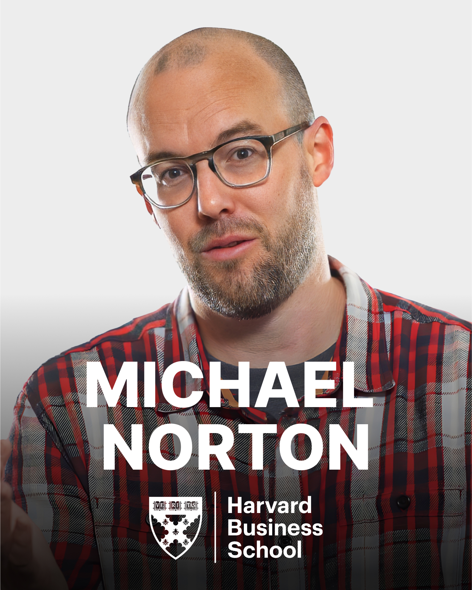 Man in glasses and plaid shirt with "Michael Norton, Harvard Business School" text overlay.