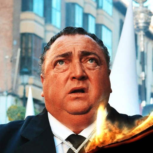 A man in a suit looks upward with a surprised expression. There is a fiery effect in the foreground. Buildings and people are visible in the background.