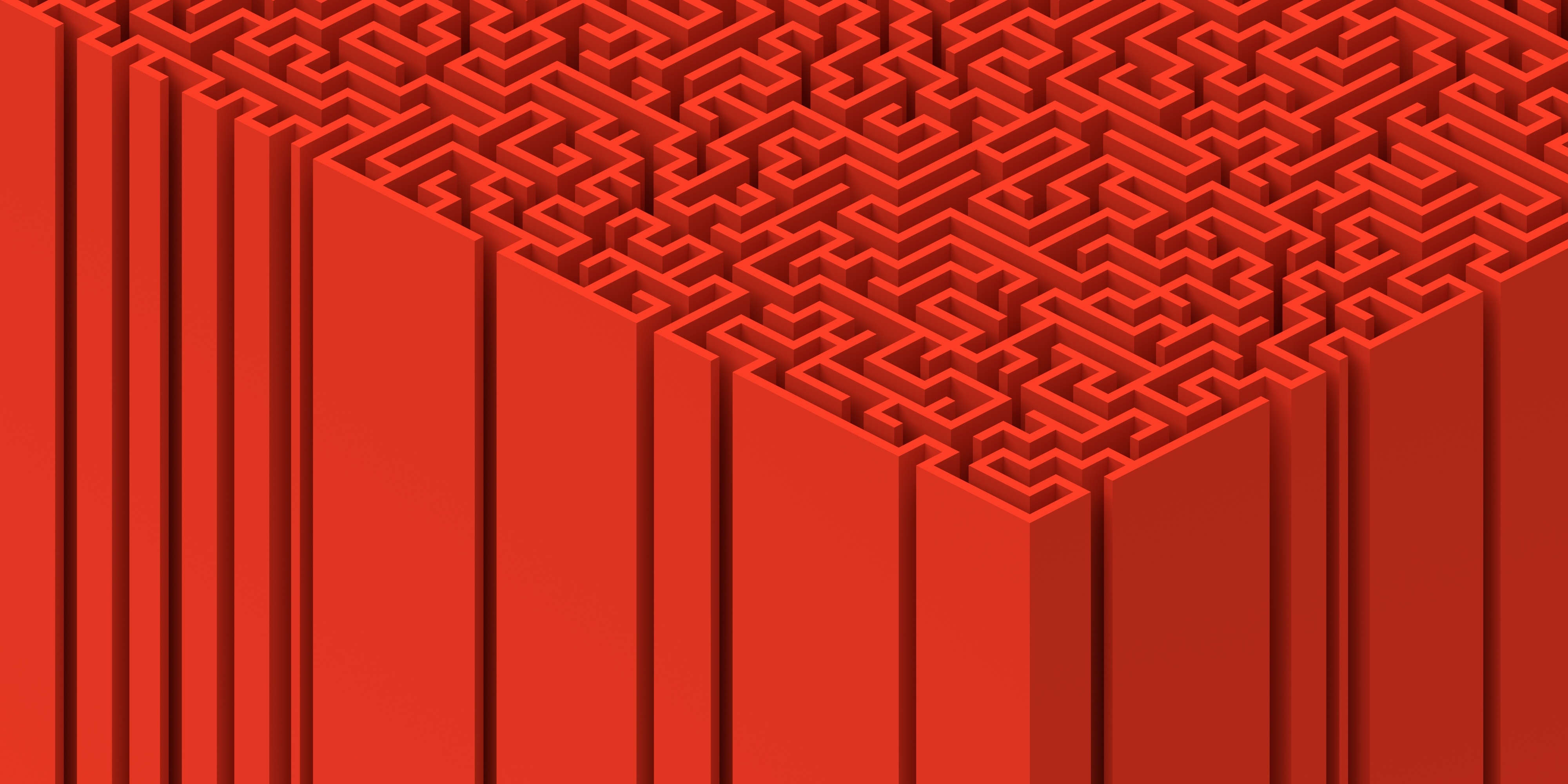 Intricate 3D red maze with vertical walls, viewed from an angle, showing complex pathways and geometric design.