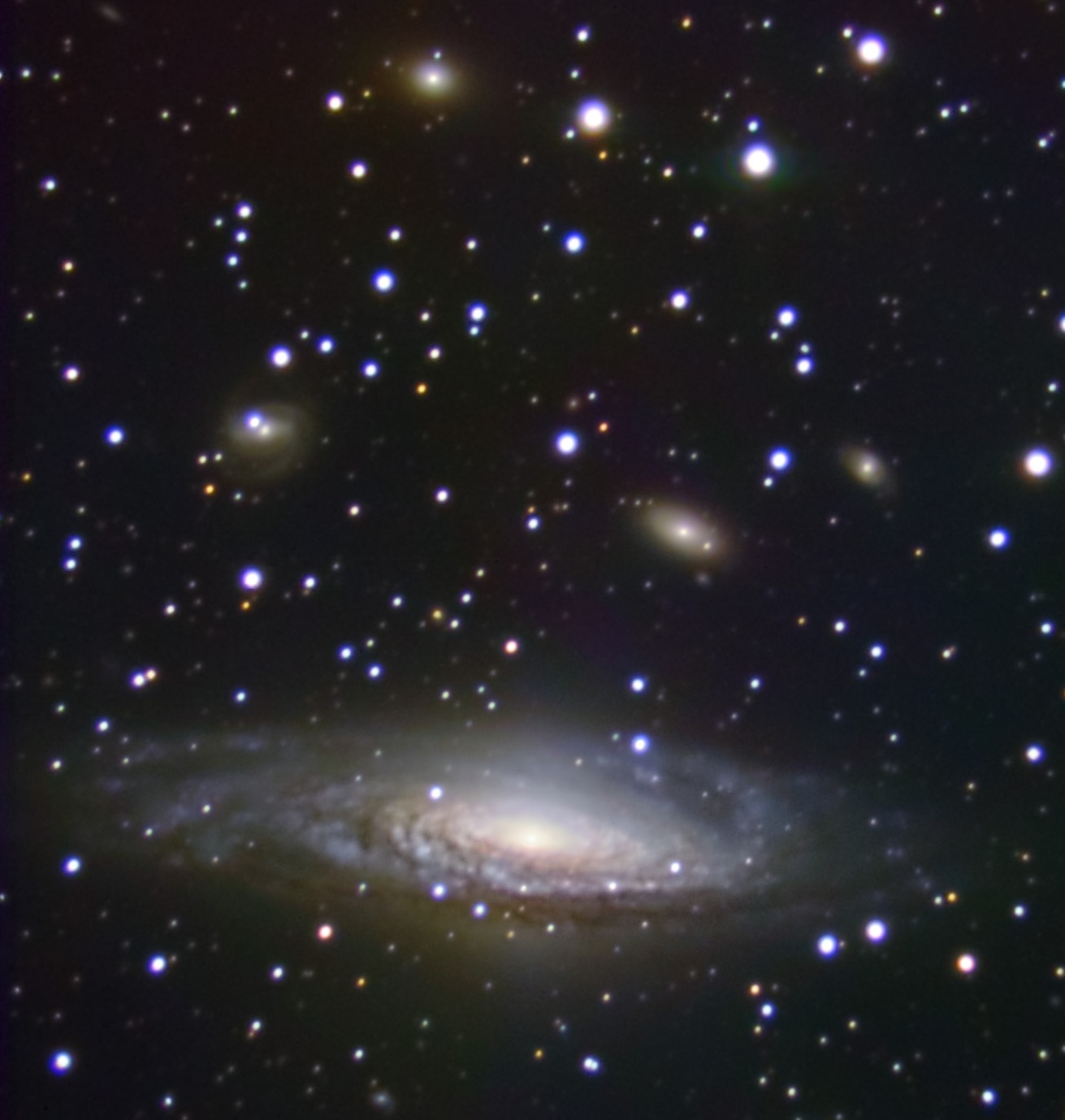 A mesmerizing spiral galaxy with a bright core, surrounded by countless stars and distant galaxies, gracefully tipped towards the edge of the cosmos against a dark background.