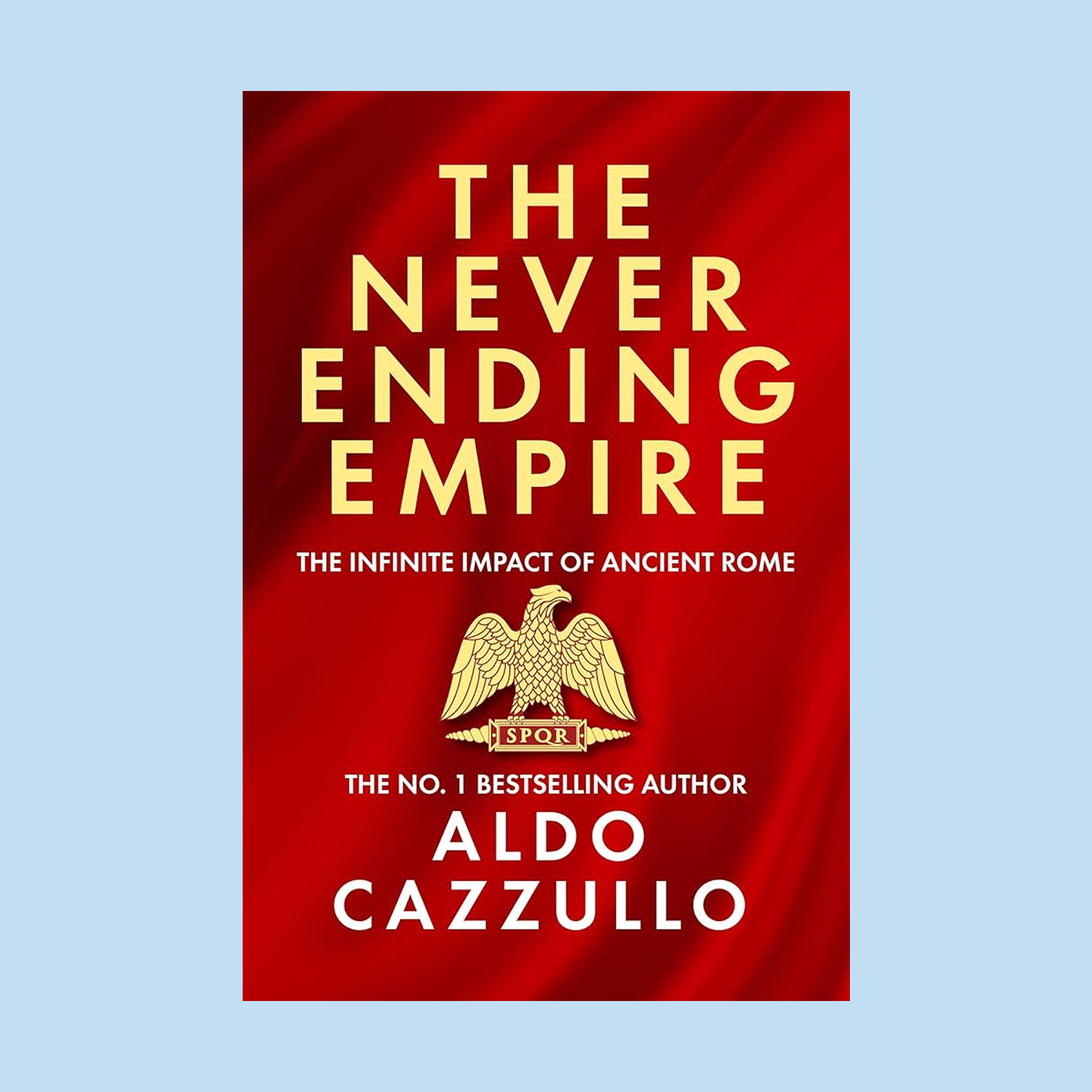Book cover of "The Never Ending Empire" by Aldo Cazzullo, featuring gold text on a red background with an eagle, SPQR emblem, and nods to the Roman Empire’s influence on British culture. Subtext: The Infinite Impact of Ancient Rome.