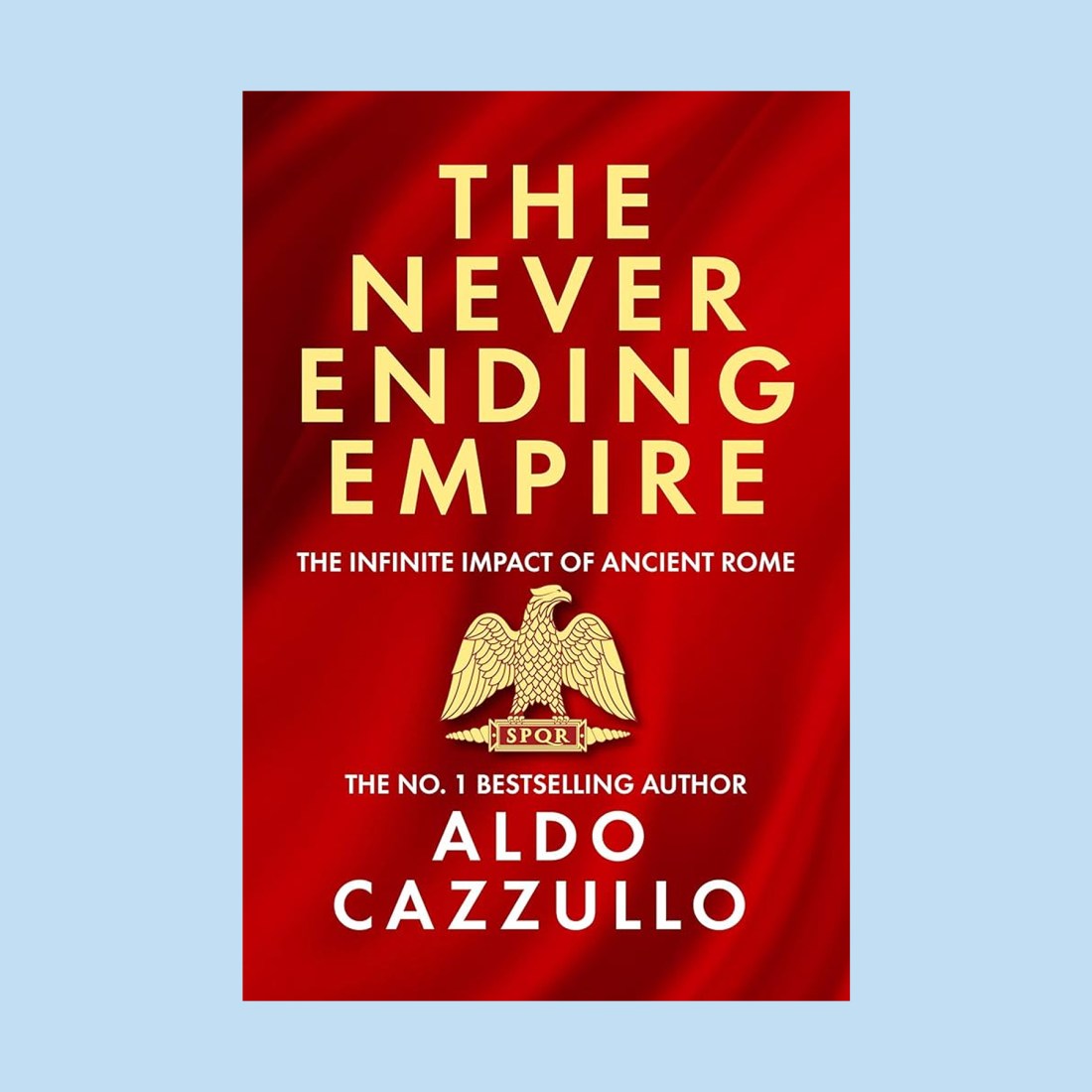 Book cover of "The Never Ending Empire" by Aldo Cazzullo, featuring gold text on a red background with an eagle, SPQR emblem, and nods to the Roman Empire’s influence on British culture. Subtext: The Infinite Impact of Ancient Rome.