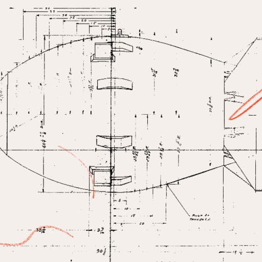 Technical drawing of an oval-shaped mechanical object with measurements and annotations, overlaid with orange scribble lines, subtly hinting at themes of colonial propaganda.