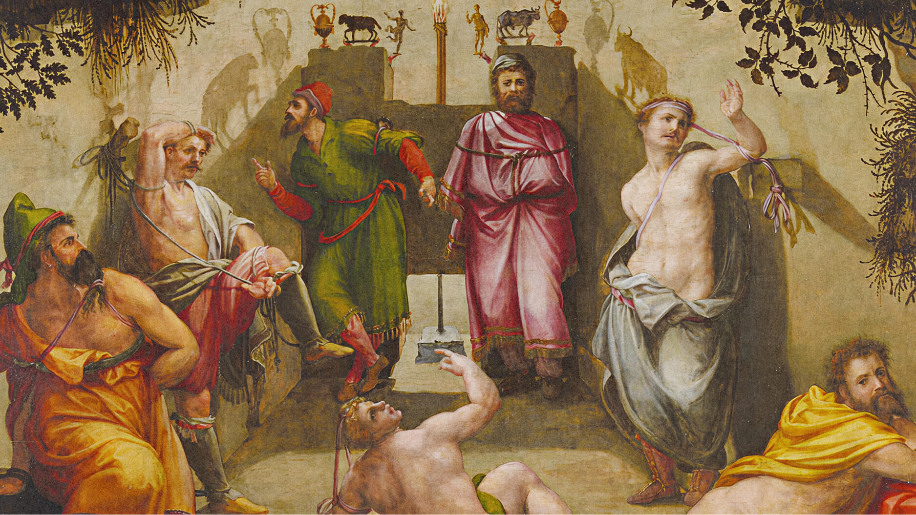 A group of people in ancient attire react to shadows cast on a wall, referencing Plato’s Allegory of the Cave.