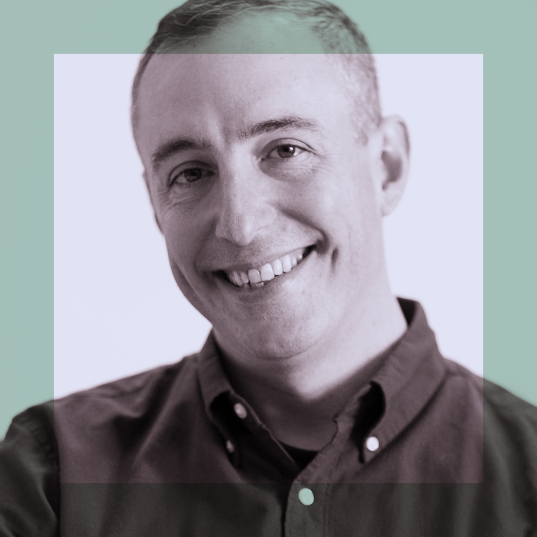 A person with short hair, wearing a button-up shirt, smiles at the camera. The image has a muted color overlay with a transparent square in the center.
