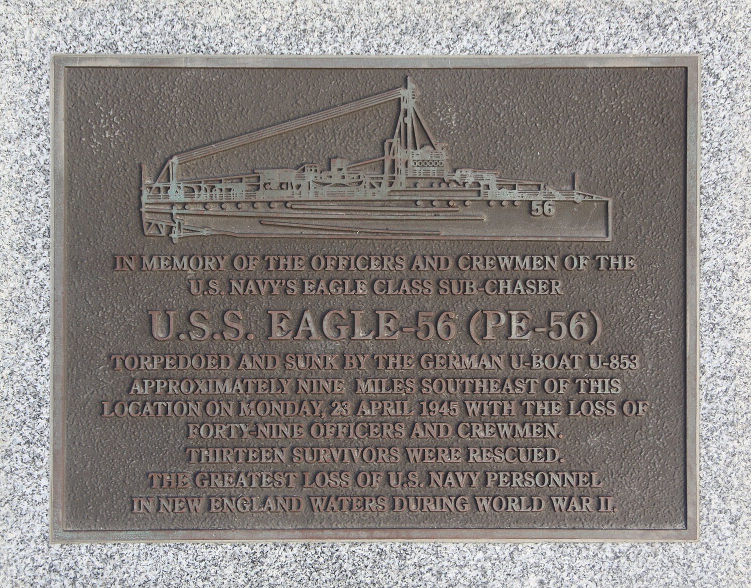 Bronze plaque honoring U.S.S. Eagle-56 (PE-56) crew lost to a German torpedo in 1945, with a raised ship image and inscription detailing the incident and its significance.