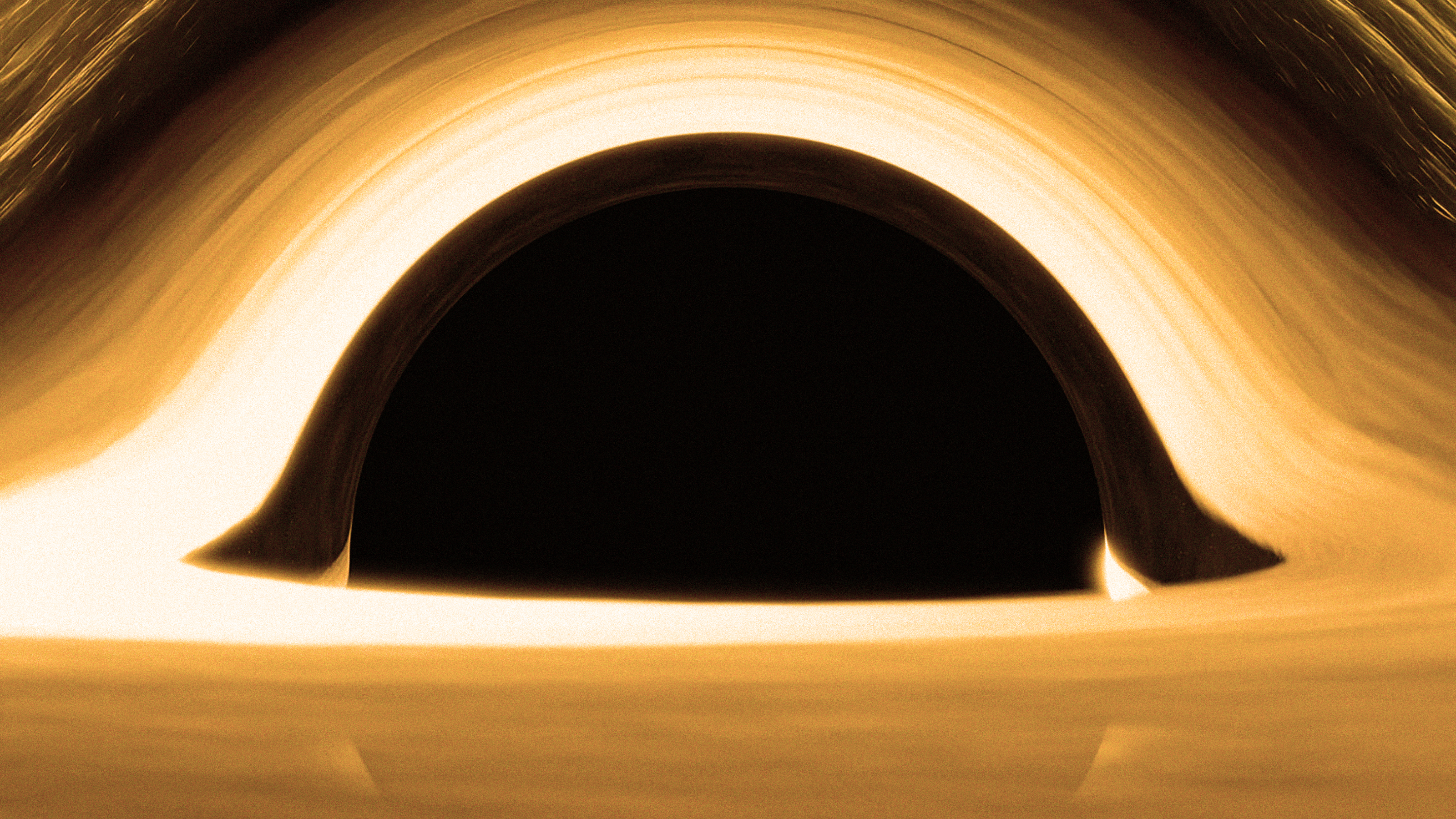 A digitally rendered black hole with a dark center and a glowing, distorted ring of light surrounding it.