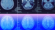 Six brain MRI scan images are arranged in two rows, showing various cross-sectional views of the human brain, with the bottom row featuring a blue and pink color overlay.