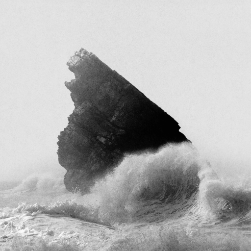 A large jagged rock juts out of rough ocean waves, with water crashing against its base under a cloudy sky—standing firm like true leadership amidst the storm.