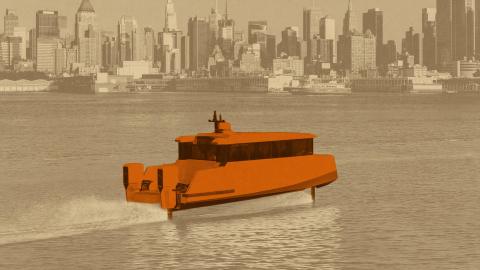 An orange hydrofoil boat glides across the water in front of a city skyline with tall buildings, resembling the sleek motion of flying boats.