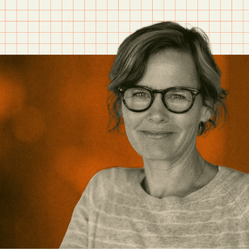 A woman with glasses and short hair smiles slightly, wearing a striped sweater, with an orange-toned background and a grid pattern above.