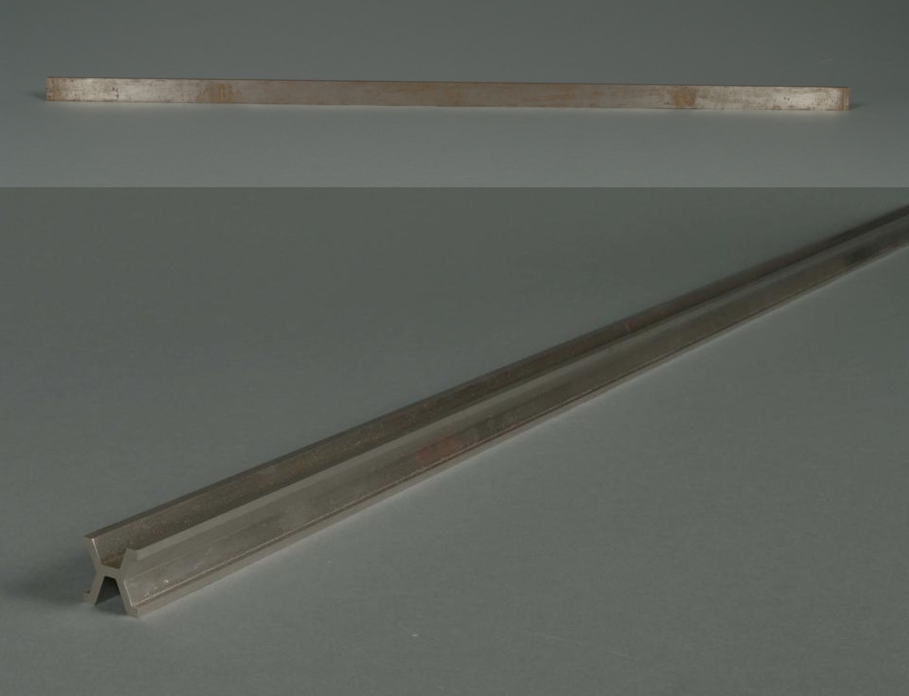 Two views of a metal bar with an I-beam cross section, one meter long, shown flat from above and at an angle on a gray background.