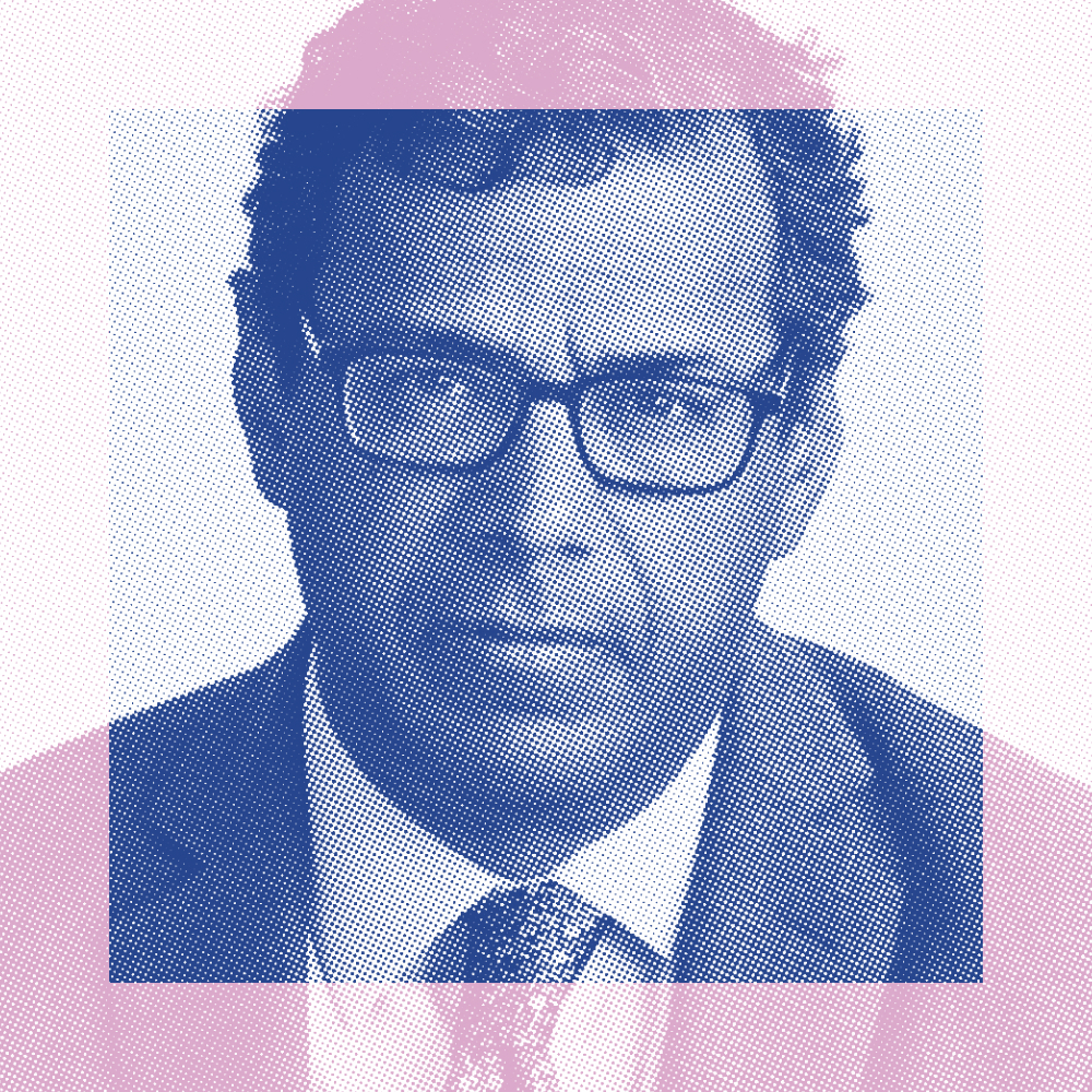 A man wearing glasses and a suit, shown in a blue and pink halftone graphic style, looking directly at the camera.
