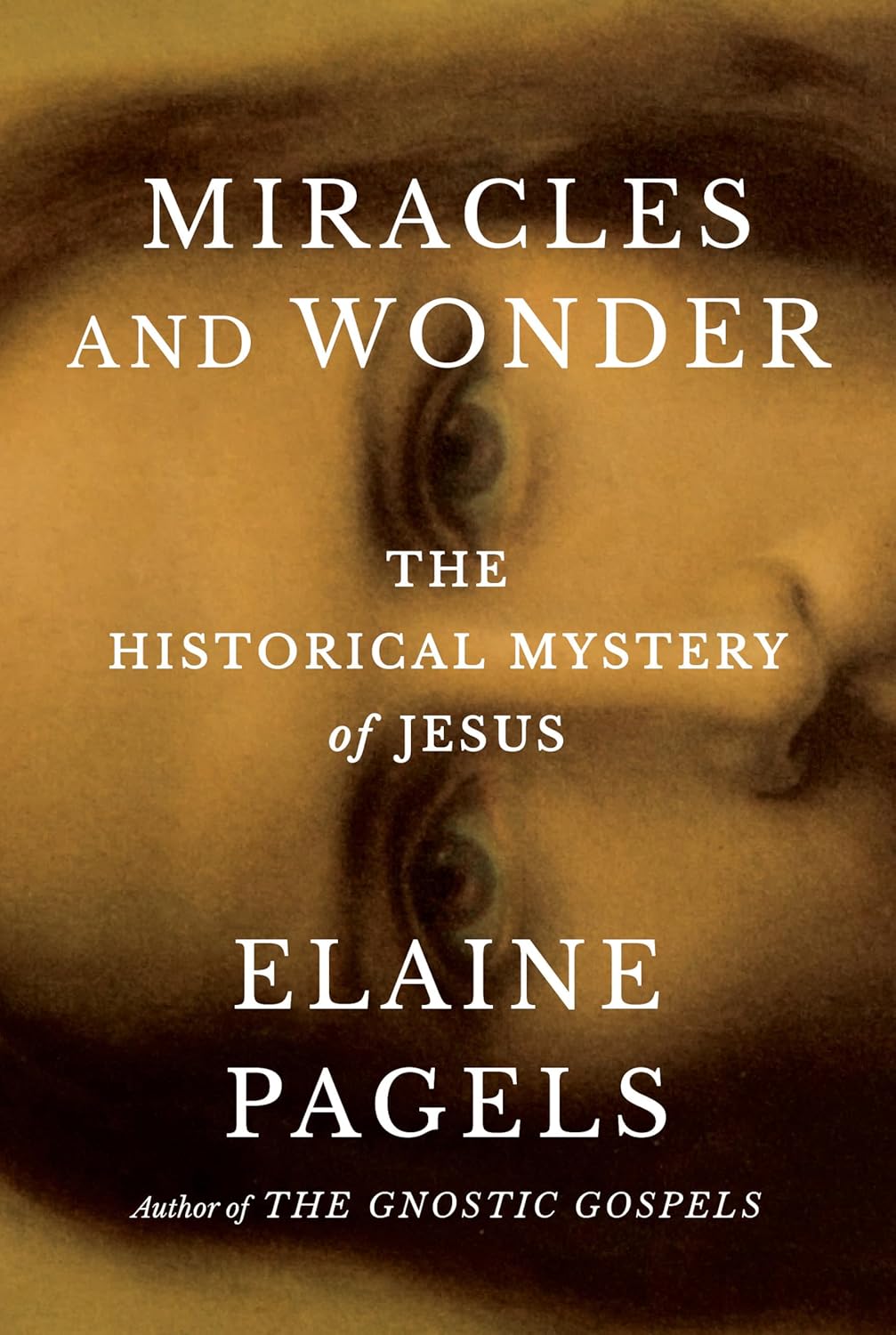 Book cover for "Miracles and Wonder: The Historical Mystery of Jesus" by Elaine Pagels, featuring a close-up of a face in sepia tones and white serif text.