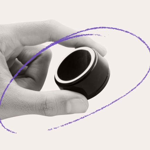 A hand holds a small, round black device with a circular light, while a purple scribble curving around both hints at rewiring democracy.