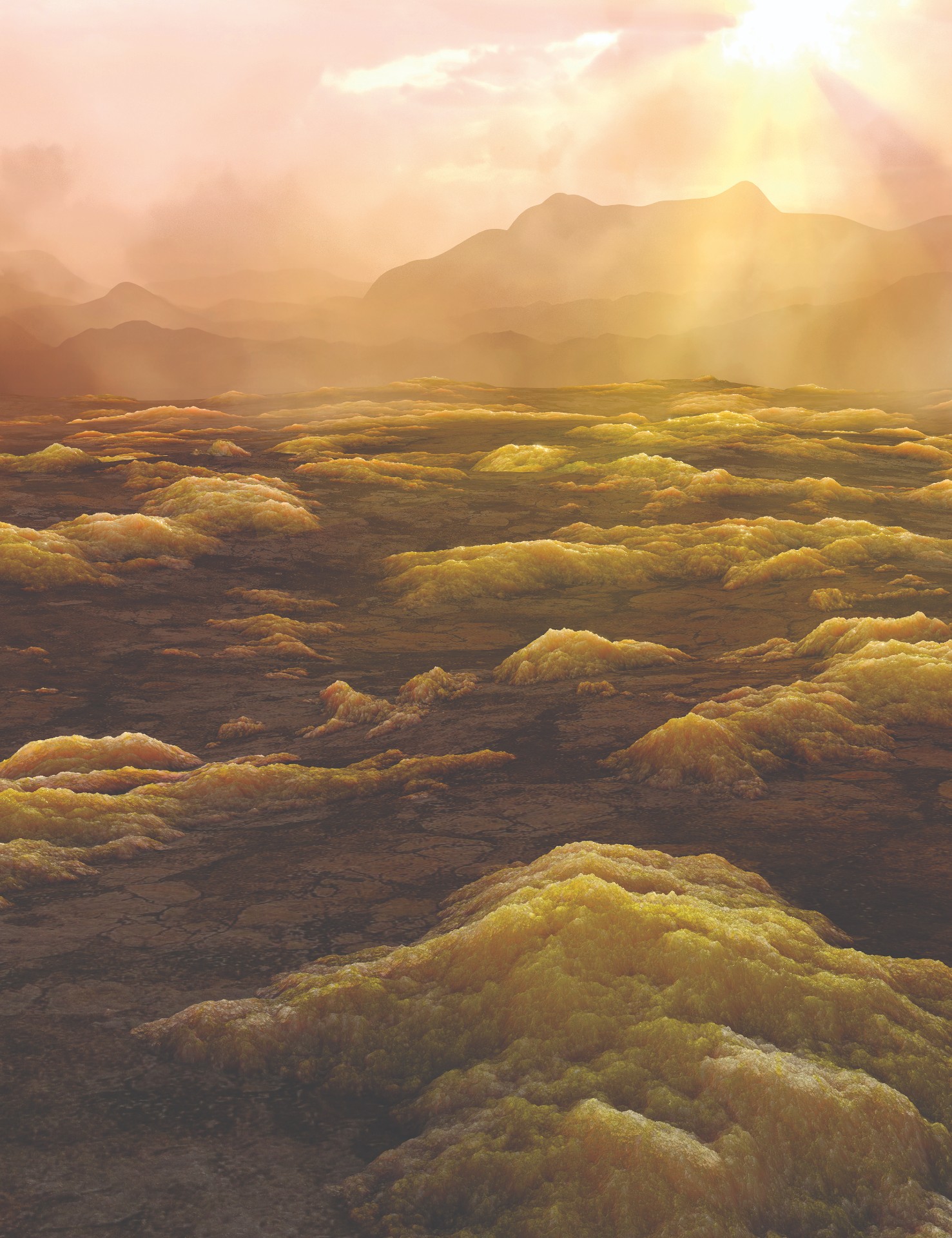 Sunlight shines over a rugged landscape covered with yellow mineral deposits and distant hazy hills under a cloudy sky.