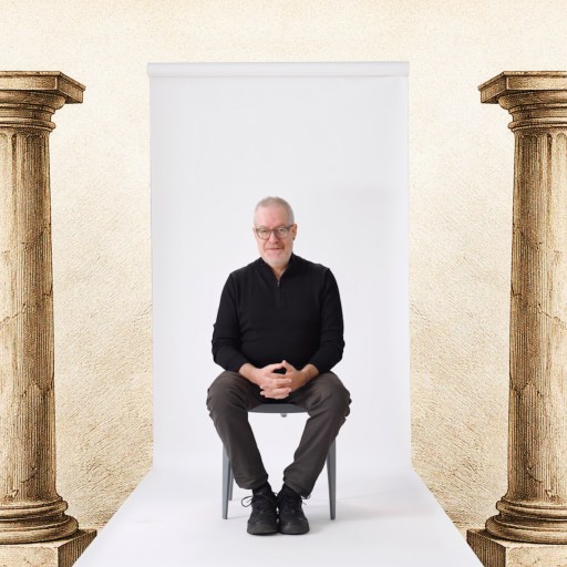 A man sitting in a chair.