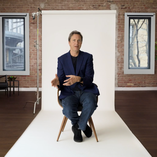 A man sitting in a chair.