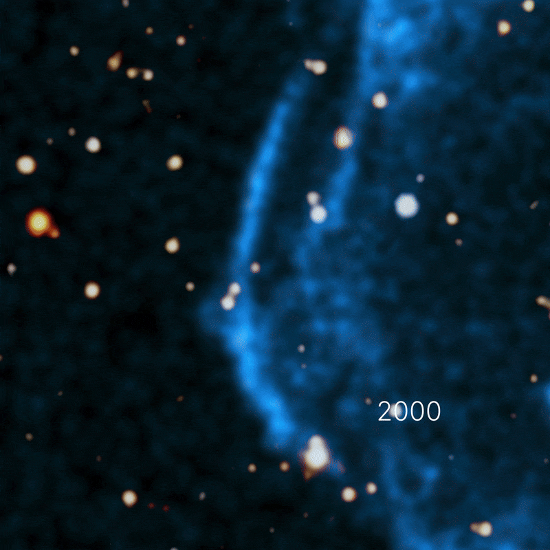 Animated image showing the expansion of a blue supernova remnant from 2000 to 2013, captured by NASA Chandra; bright orange and white stars scatter the background, revealing Kepler's supernova as it expands over 25 years.