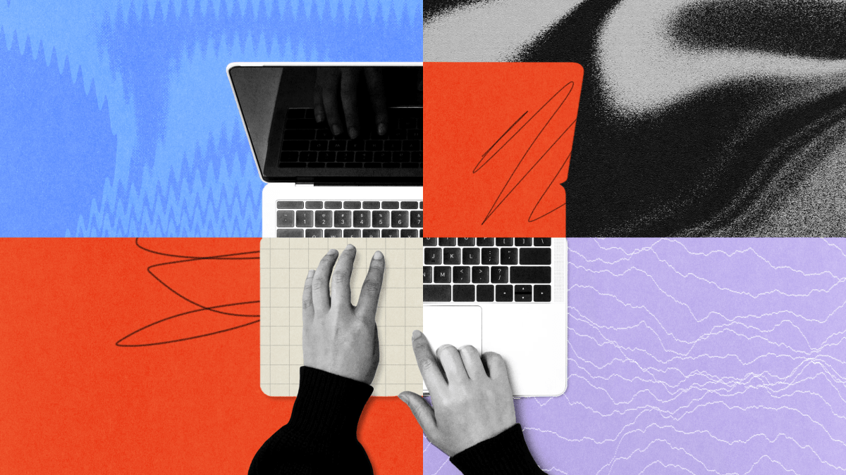 A hand types on a laptop keyboard with a visually segmented, abstract background in shades of blue, red, black, and purple.