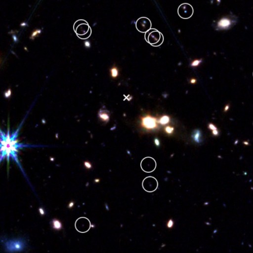 Image of a star field with numerous galaxies; several objects are circled in white, and one object is marked with an “X” near the center.