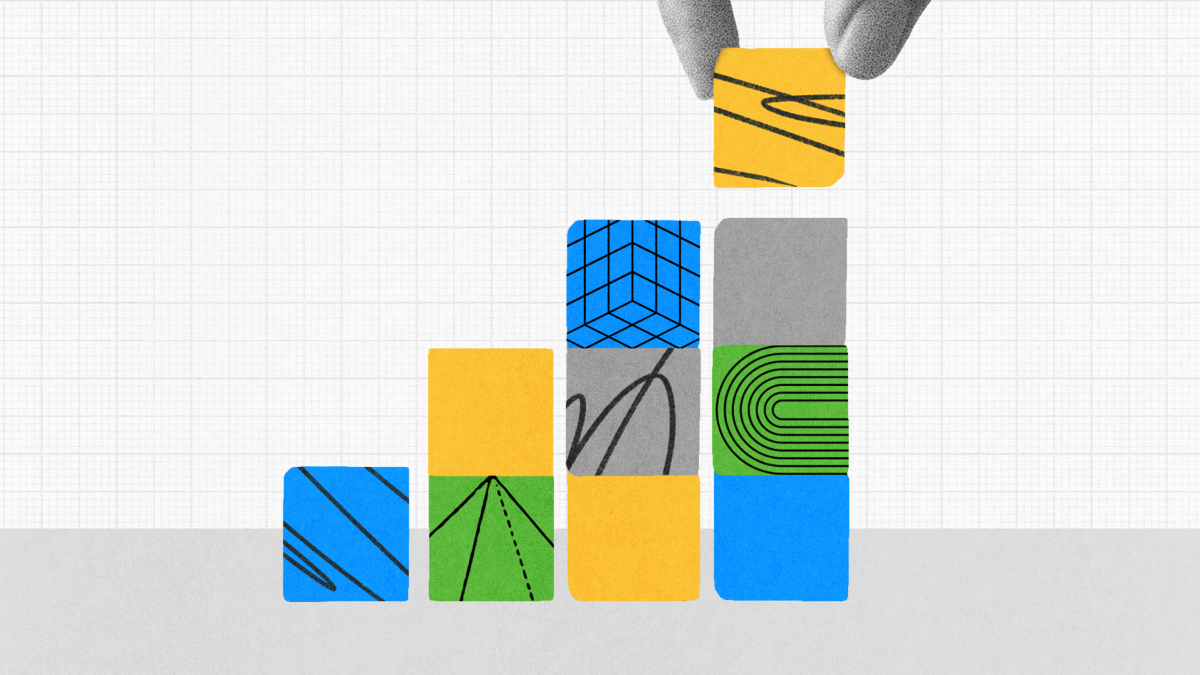A hand places a patterned yellow block on top of colorful stacked blocks arranged in ascending order against a grid background.