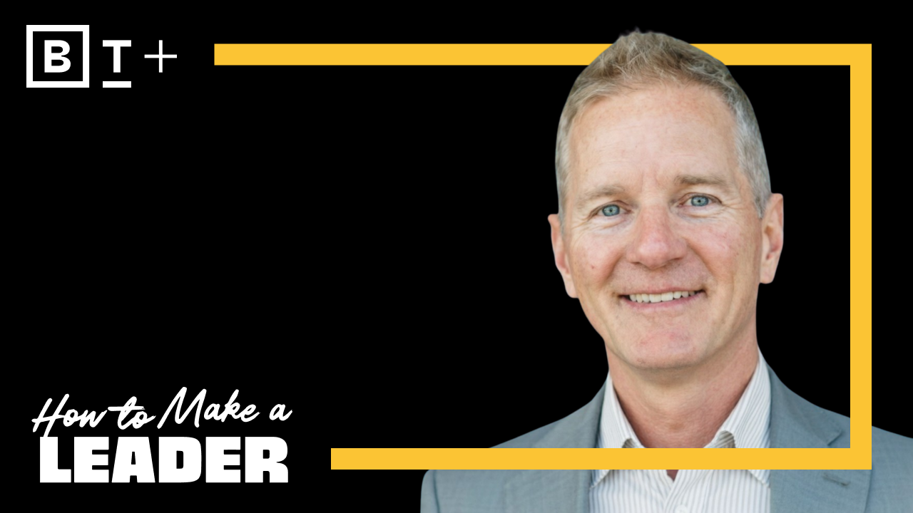 Smiling man in a suit on a black background with yellow border; text reads "How to Make a Leader" and "BT+" in the top left corner.