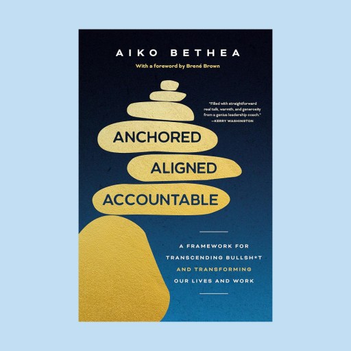 Book cover for "Anchored, Aligned, Accountable" by Aiko Bethea, featuring gold stacked stones on a blue background and a subtitle about transforming lives and work by overcoming the false urgency myth.