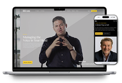 A laptop and a smartphone display a website featuring a man speaking in a video and his portrait photo, with text and navigation elements visible on both screens.